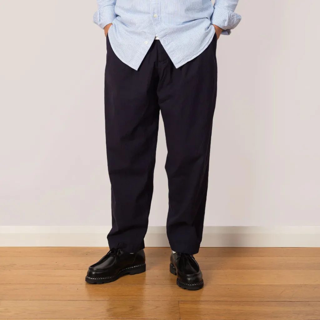Trousers|Universal Works Pleated Track Pant - Navy Seersucker