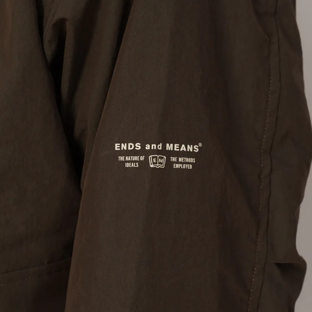 Jackets|Ends and Means Travel Half Parka - African Black